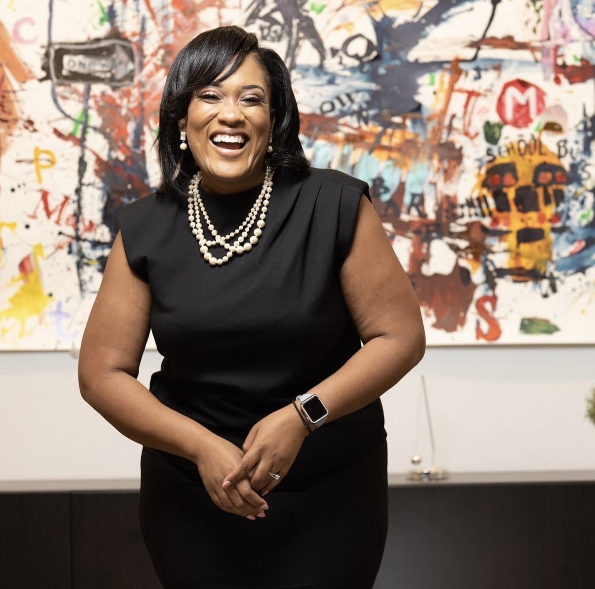 Kelli Turner laughing during a candid moment in the office